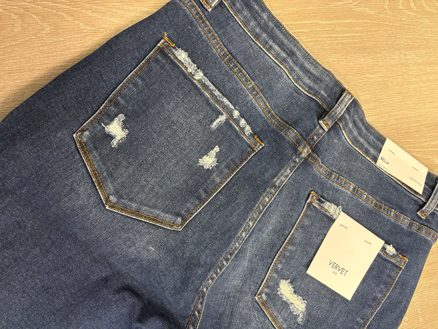 High Rise Distressed Hem Kick Flare Jeans
